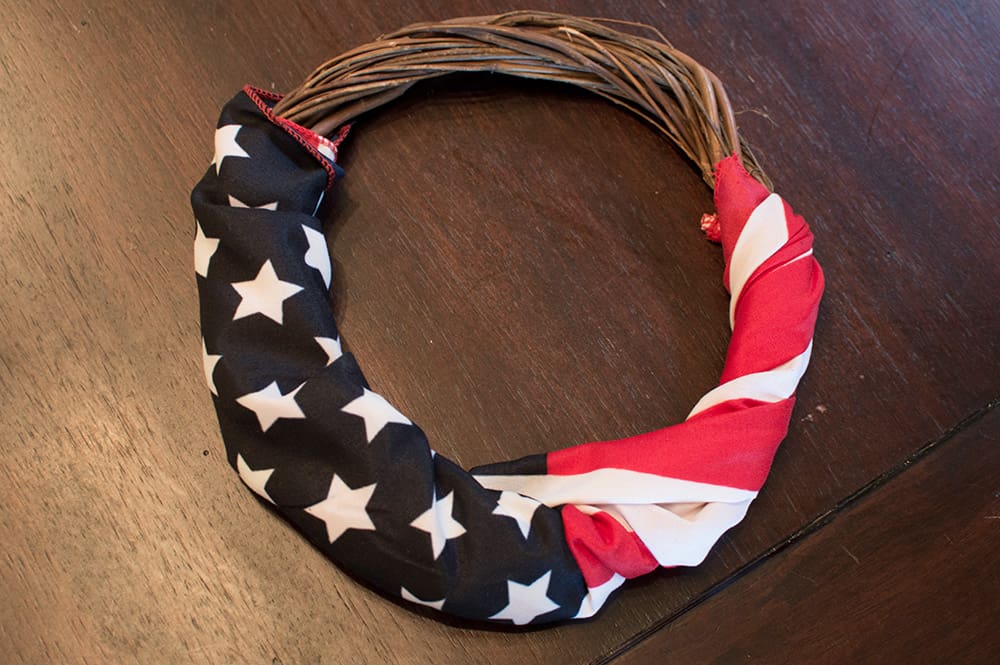 Step 2: Wrap Flag around your wreath -- DIY 4th of July Wreath from Elva M Design Studio