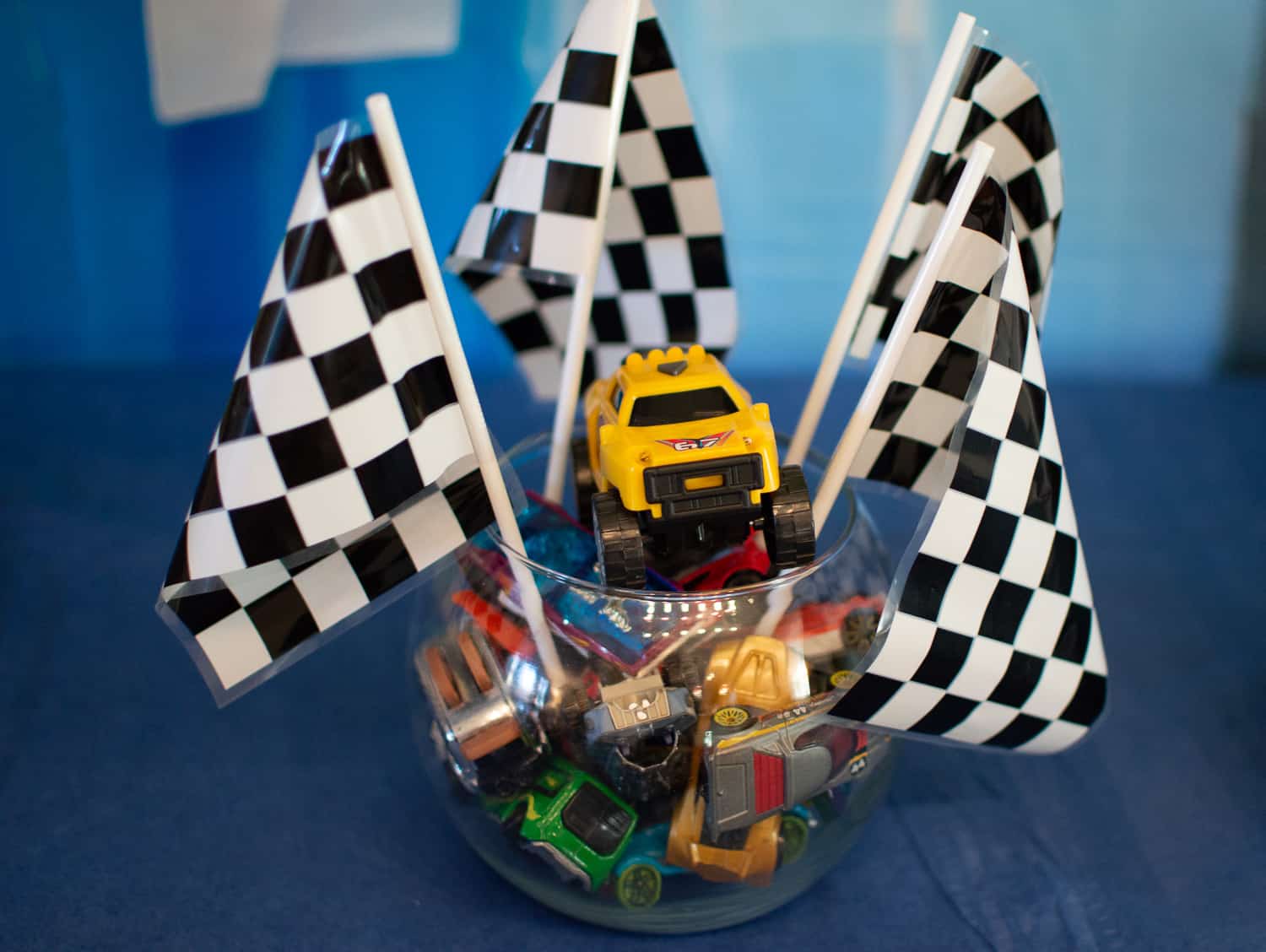 Checkered racing flag and truck centerpiece