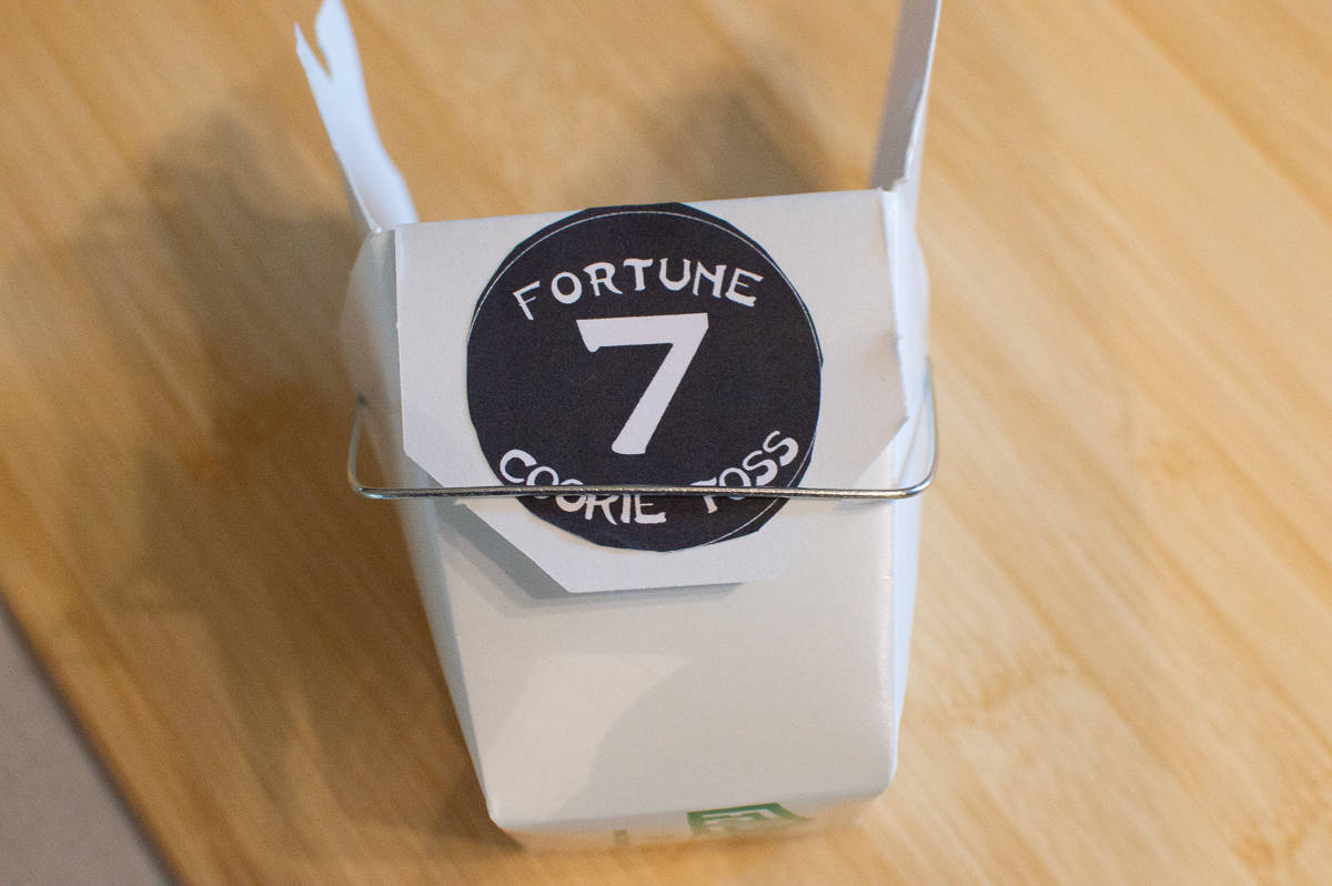 Glue Fortune Cookie Toss game pieces to takeout containers