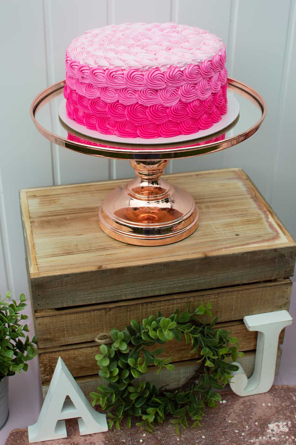 Amalfi Decor Rose Gold Cake Stand with pink rosette cake